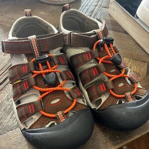 Keen Brown and Orange Water Shoes with Closed Toe Design and Breathable Upper